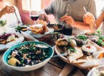 Happy people sharing their healthy lunch
